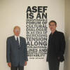 Dr. Hans Koechler, President of the I.P.O., left, with Mr. Bertrand Fort, Deputy Director-General of ASEF, in front of Hans Koechler's testimonial, displayed on the wall of ASEF headquarters on the occasion of the foundation's 10th anniversary, Singapore, 22 June 2007