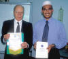 Prof. Hans Kchler, left, exchanging gifts with the Vice-President (International) of the Muslim Youth Movement of Malaysia (ABIM), Mr. Azril Mohamed Amin, after a briefing session at the ABIM headquarters in Gombak, Malaysia (18 January 2007)